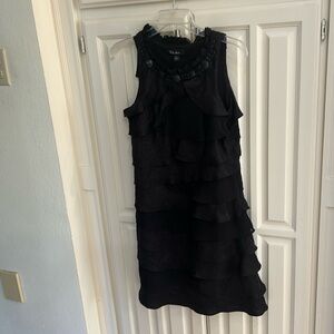 Black dressy dress size 12. Never worn, brand new.  SL Fashions brand.